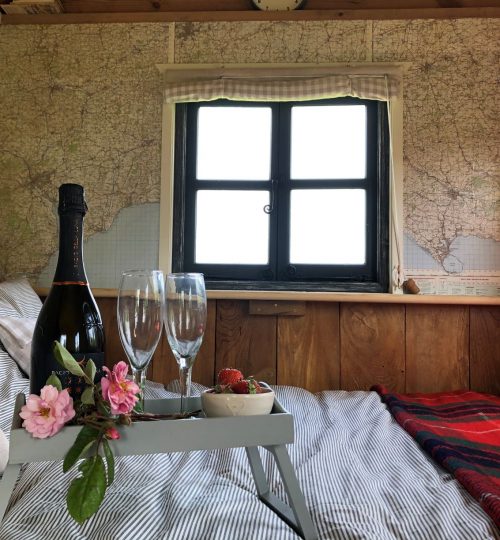 Prosecco in Bed - special occasion shepherd's hut getaway in dorset